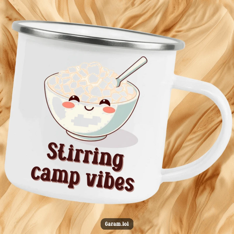 Funny camping mug with a smiling rice bowl and a tiny stirring spoon, perfect for outdoor dining.