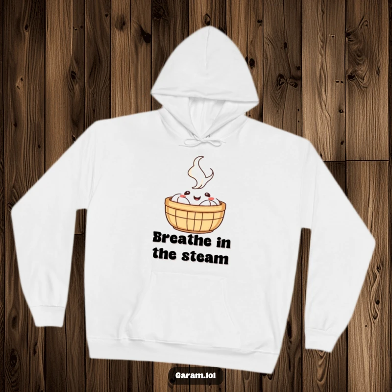 Funny hoodie featuring a happy dim sum basket, with playful steam rising, creating a sense of cozy contentment.