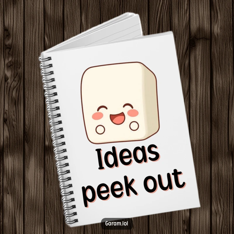 Funny bento box notebook with a laughing bento box peeking out, perfect for notes and planning.