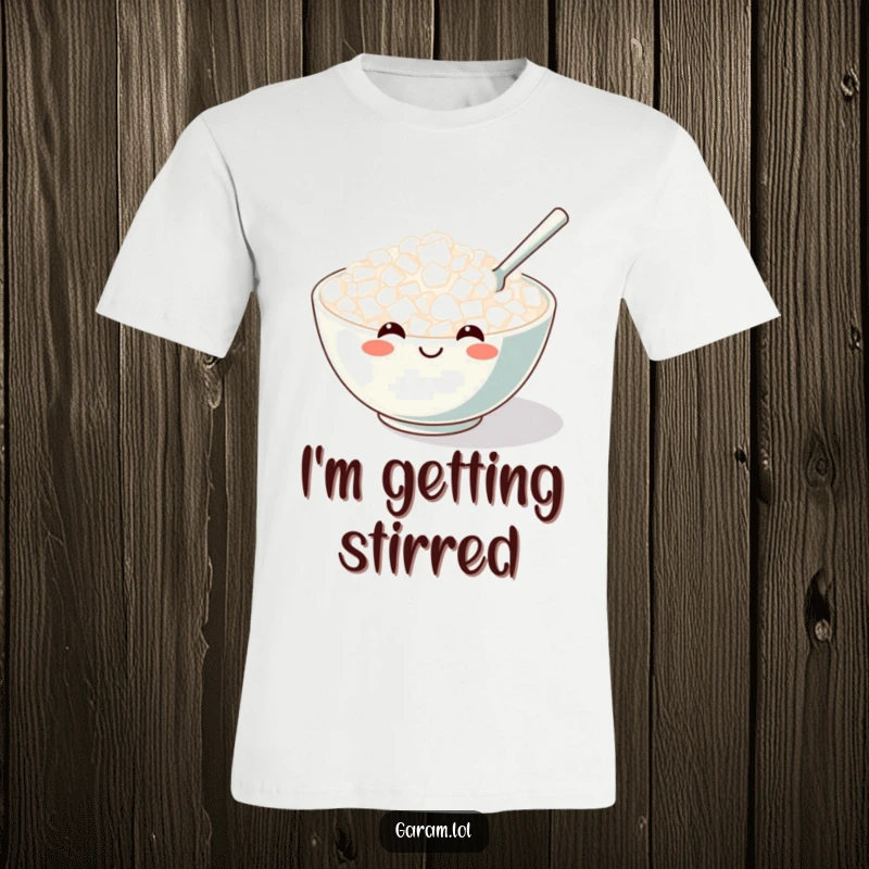 Funny t-shirt graphic of a smiling bowl of rice being happily stirred by a miniature spoon.
